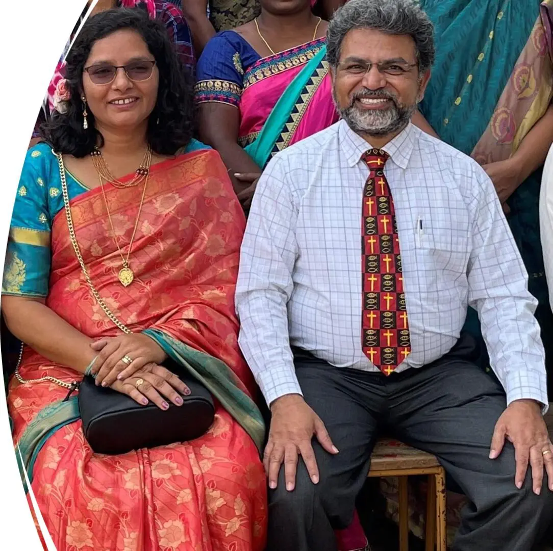 A man and woman in traditional indian garb.