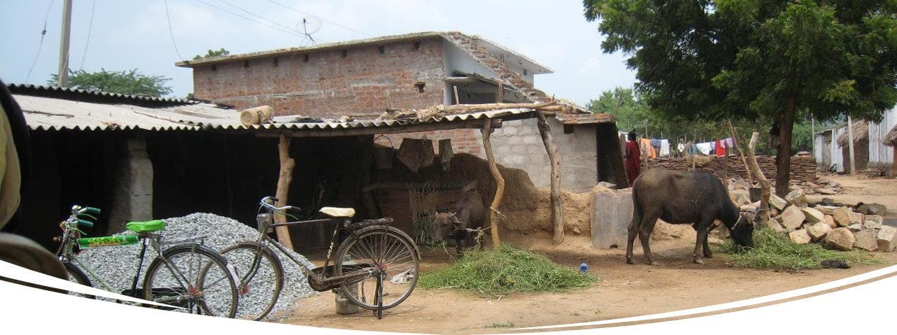 A bicycle parked in front of a building.