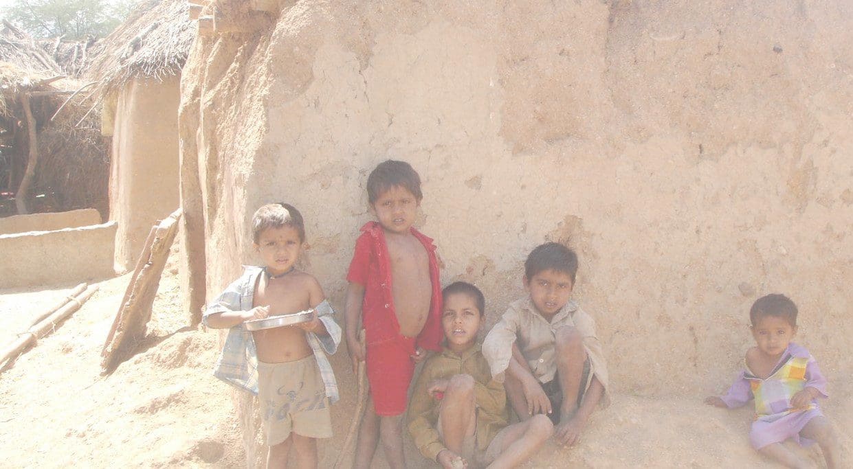 A group of children standing next to each other.